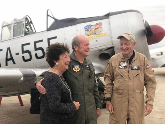 General in front of plane