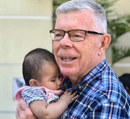 silverado resident holding a baby