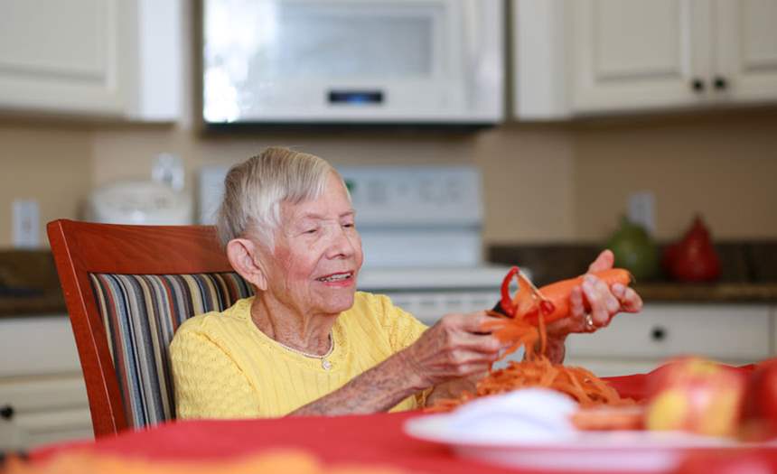 Resident prepping vegetables