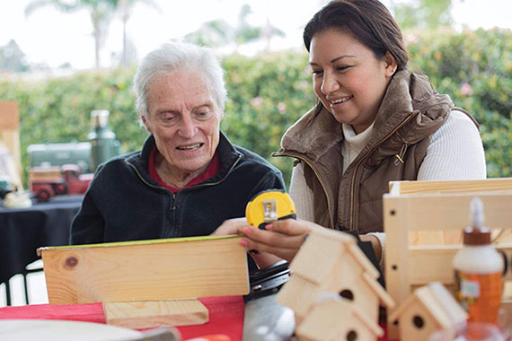 Resident working on woodworking crafts