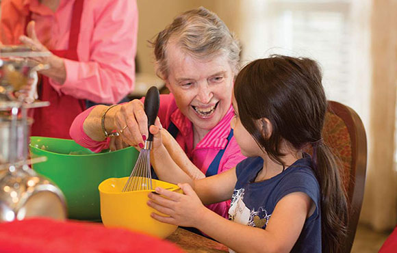 Resident playing with child